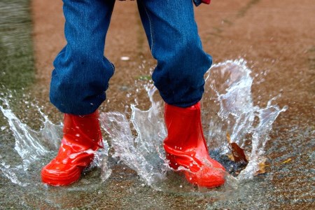 a pair of rain boot on water